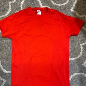 Gymshark tight fit athletic shirt… great for running or any physical activity!